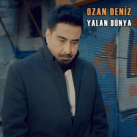 Скачать песню Ozan Deniz - Yalan Dünya