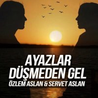 Скачать песню Özlem Aslan & Servet Aslan - Ayazlar Düşmeden Gel