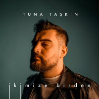 Скачать песню Tuna Taşkın - İkimize Birden